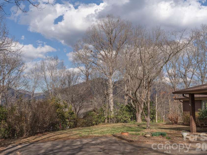 200 Canterbury Road, Cullowhee, NC 28723.  MLS# CAR4350143, YatesRealty ID 3524. Panoramic mountain views