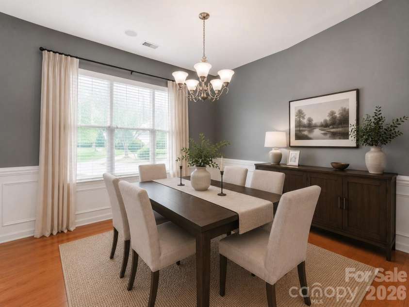 10333 Misty Moss Court, Mint Hill, NC 28227.  MLS# CAR4375838, YatesRealty ID 35242. Virtually Staged Dining Room