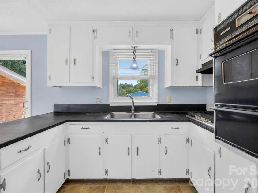 205 Gaddis Drive, Mount Holly, NC 28120.  MLS# CAR4393713, YatesRealty ID 35243. 