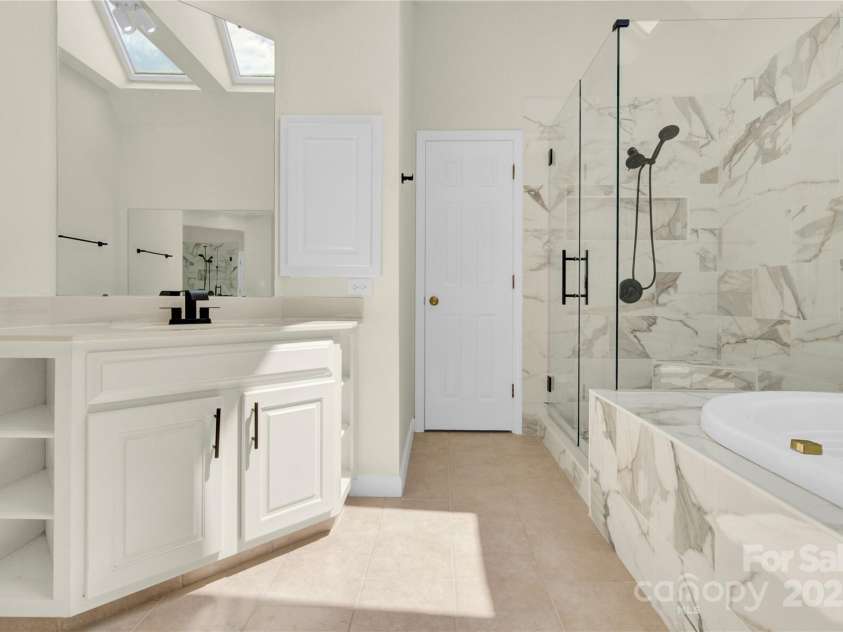 11201 Tavernay Parkway, Charlotte, NC 28262.  MLS# CAR4277991, YatesRealty ID 35248. Master Bath 2