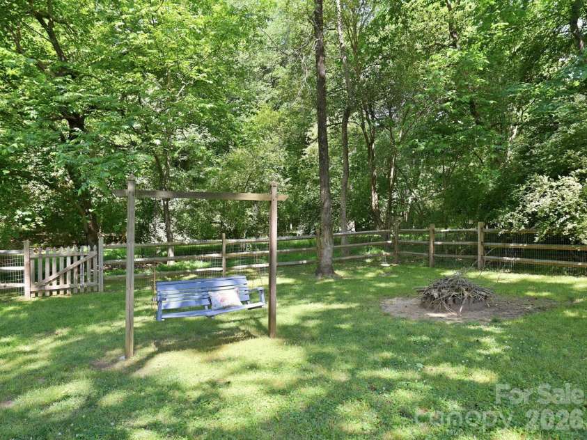 1203 Old Nation Road, Fort Mill, SC 29715.  MLS# CAR4376720, YatesRealty ID 35252. Swing and fire pit