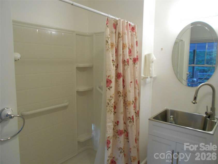 18 Herron Street, Black Mountain, NC 28711.  MLS# CAR4357548, YatesRealty ID 35259. Bath with walk-in shower
