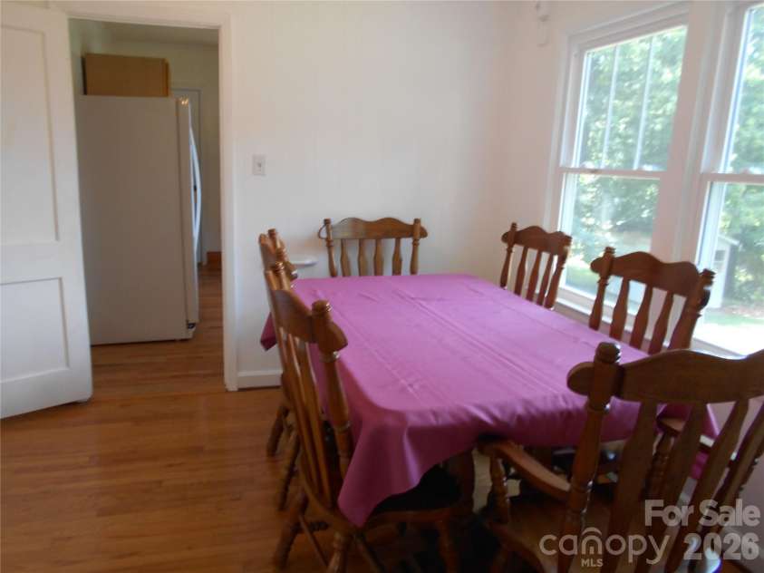 18 Herron Street, Black Mountain, NC 28711.  MLS# CAR4357548, YatesRealty ID 35259. Dining room view from living room