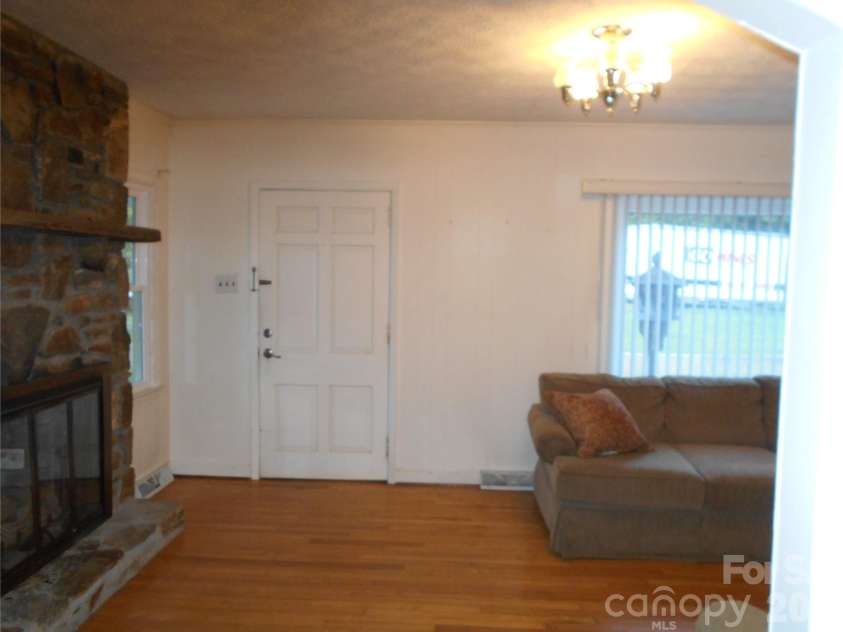 18 Herron Street, Black Mountain, NC 28711.  MLS# CAR4357548, YatesRealty ID 35259. Front door as seen from dining room