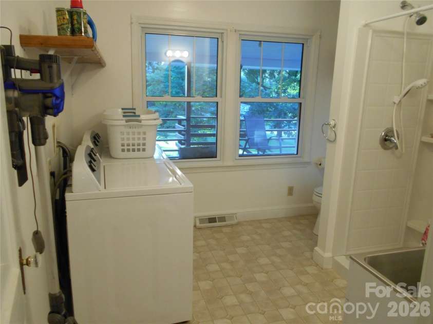 18 Herron Street, Black Mountain, NC 28711.  MLS# CAR4357548, YatesRealty ID 35259. Laundry located in bathroom
