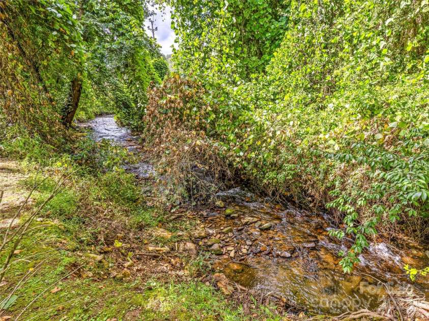 112 Creekside Drive, Brevard, NC 28712.  MLS# CAR4297449, YatesRealty ID 35264. 