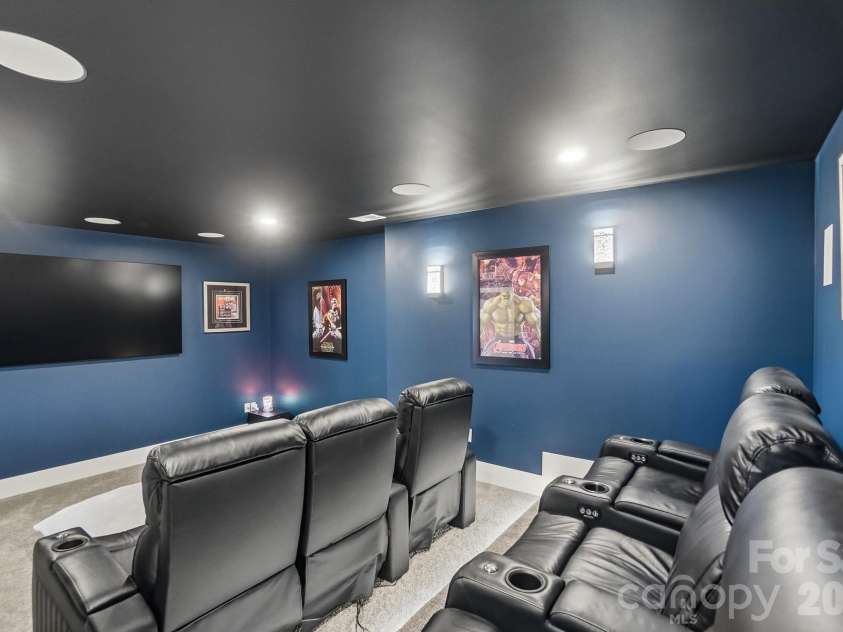 5225 Glenwalk Drive, Charlotte, NC 28269.  MLS# CAR4381104, YatesRealty ID 35264. Home Theater with risers  in basement