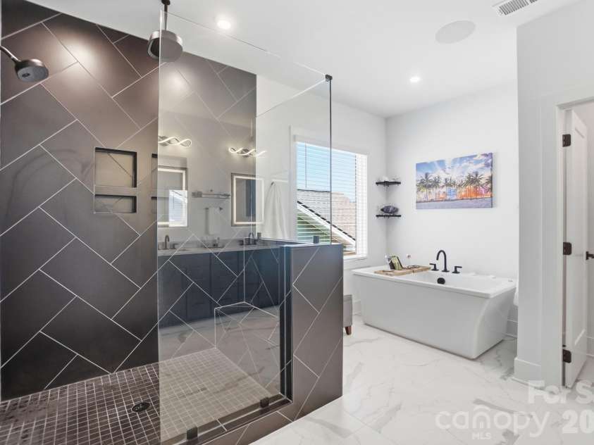 5225 Glenwalk Drive, Charlotte, NC 28269.  MLS# CAR4381104, YatesRealty ID 35264. Kohler Digital Shower with body jets and rain shower head