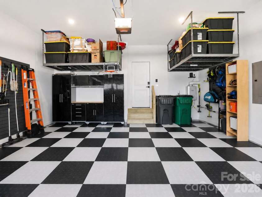 5225 Glenwalk Drive, Charlotte, NC 28269.  MLS# CAR4381104, YatesRealty ID 35264. Oversized garage with NewAge cabinets, Saferacks and 3 Slat Walls