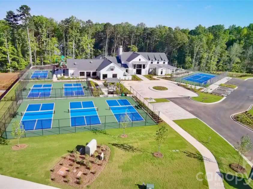 5225 Glenwalk Drive, Charlotte, NC 28269.  MLS# CAR4381104, YatesRealty ID 35264. Pickleball and Tennis courts, playground and fitness center inside
