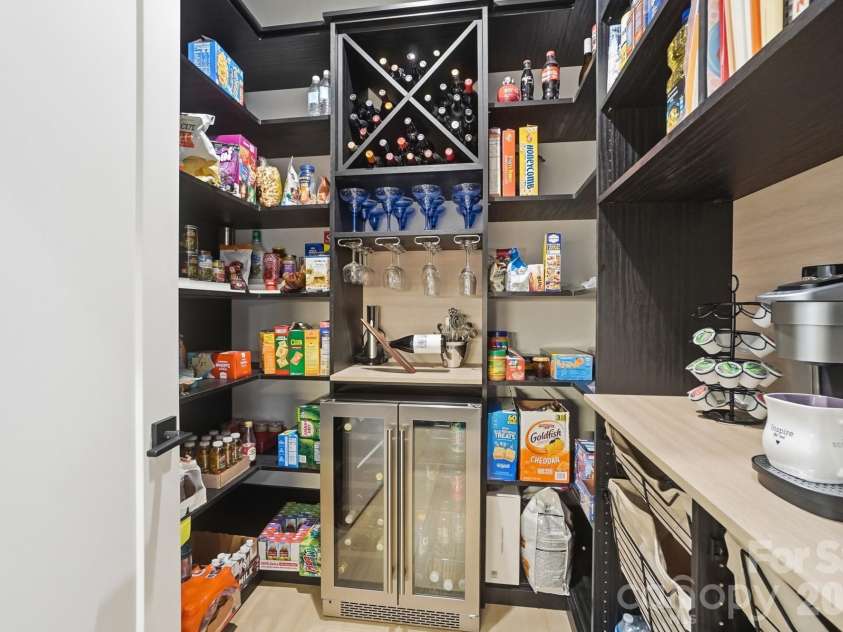 5225 Glenwalk Drive, Charlotte, NC 28269.  MLS# CAR4381104, YatesRealty ID 35264. Reimagined pantry with coffee bar and beverage center