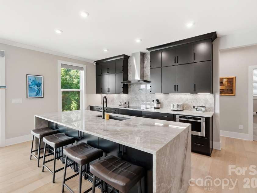 5225 Glenwalk Drive, Charlotte, NC 28269.  MLS# CAR4413191, YatesRealty ID 35264. Kitchen with Waterfall Island