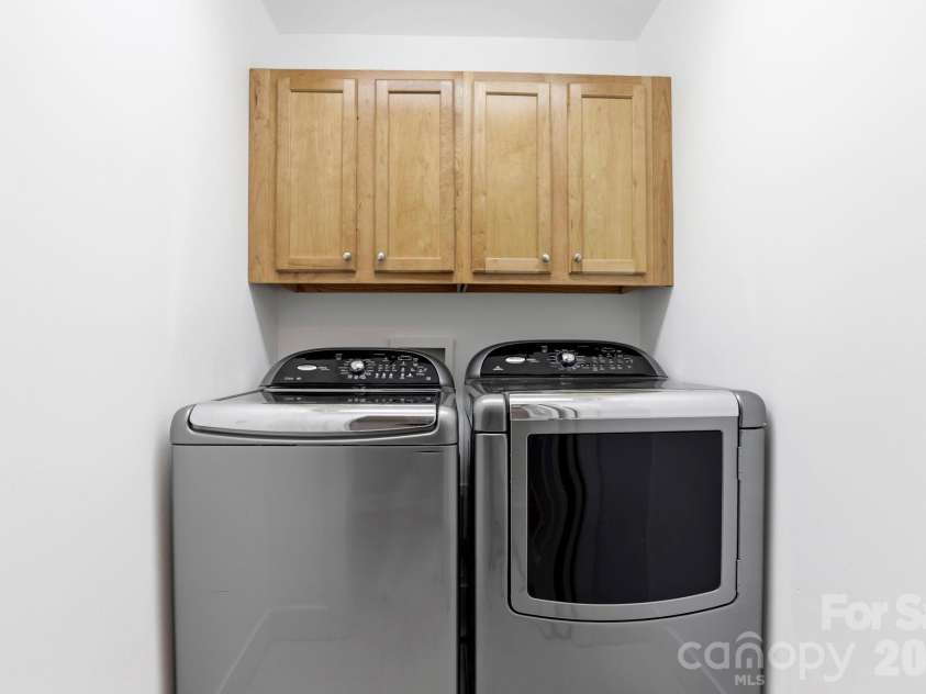 15 Kaylor Drive, Arden, NC 28704.  MLS# CAR4388754, YatesRealty ID 35268. Laundry Area off kitchen and garage