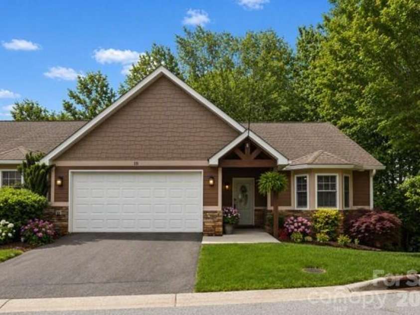 15 Kaylor Drive, Arden, NC 28704.  MLS# CAR4388754, YatesRealty ID 35268. Virtual flowers to show potential for landscaping creativity