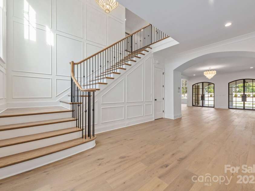 1420 Bevis Drive, Charlotte, NC 28209.  MLS# CAR4291291, YatesRealty ID 35269. Foyer Detail and staircase layout from previous build built by Barringer Homes -- for visual representation only