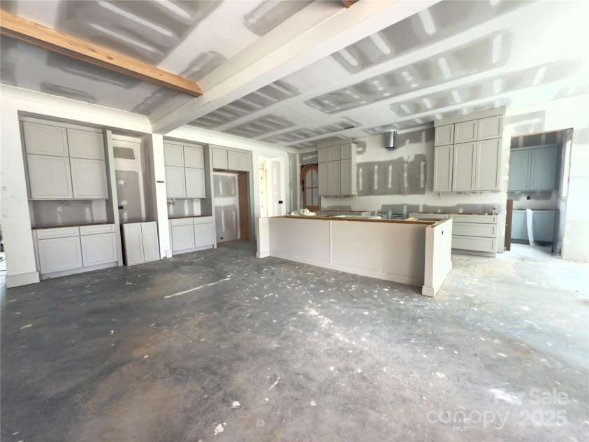 1420 Bevis Drive, Charlotte, NC 28209.  MLS# CAR4291291, YatesRealty ID 35269. View from Living into Kitchen & Visual of Scullery