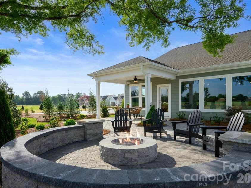 3244 Gavin Lane, Harrisburg, NC 28075.  MLS# CAR4391615, YatesRealty ID 35273. Custom Fire Pit