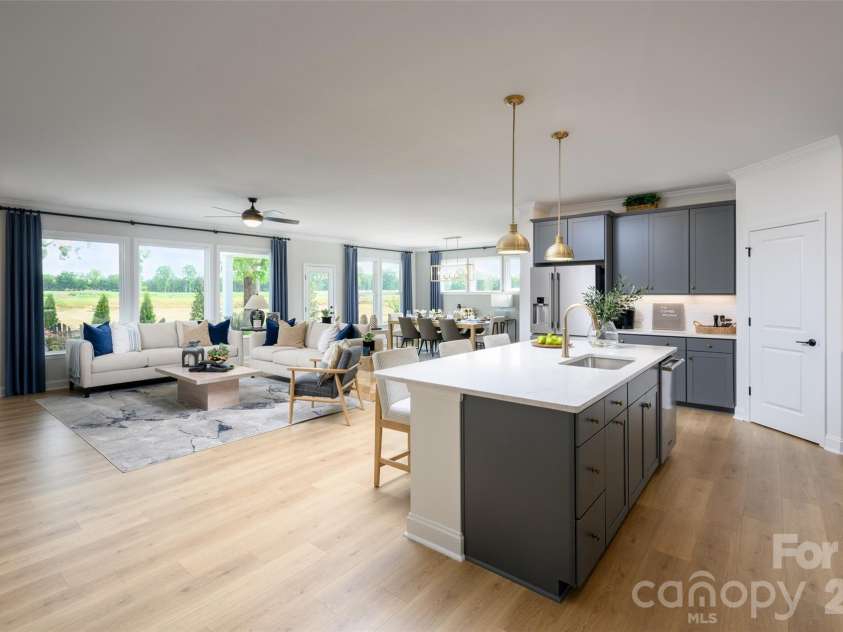 3244 Gavin Lane, Harrisburg, NC 28075.  MLS# CAR4391615, YatesRealty ID 35273. Family Room/Kitchen
