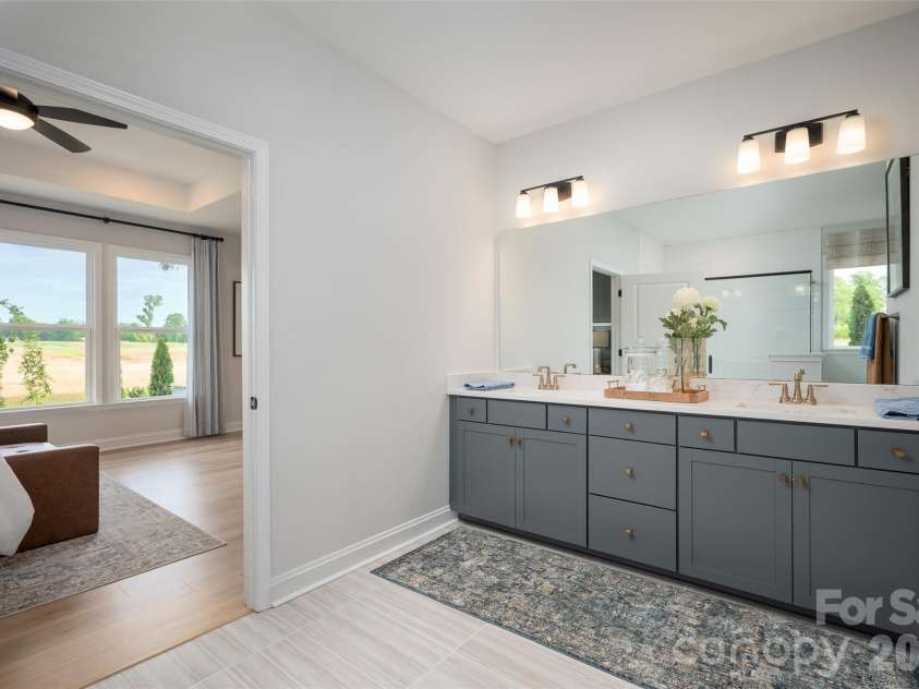 3244 Gavin Lane, Harrisburg, NC 28075.  MLS# CAR4391615, YatesRealty ID 35273. Primary Bathroom