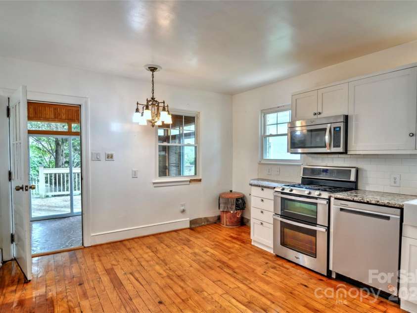 1960 Maryland Avenue, Charlotte, NC 28209.  MLS# CAR4282355, YatesRealty ID 35278. Breakfast Area leads to Sun Porch1960 Maryland AveCharlotte NC