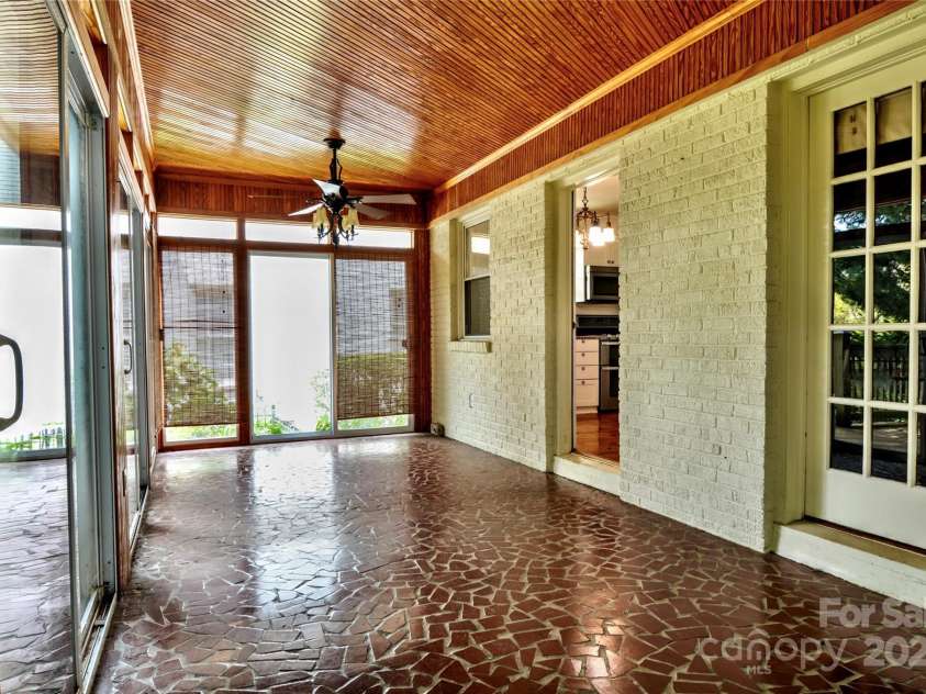 1960 Maryland Avenue, Charlotte, NC 28209.  MLS# CAR4282355, YatesRealty ID 35278. Sun Porch has two entrances to house1960 Maryland Ave