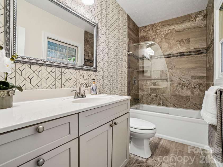 10 Chestnut Top Circle, Mills River, NC 28759.  MLS# CAR4392677, YatesRealty ID 35280. Lower Level Bathroom