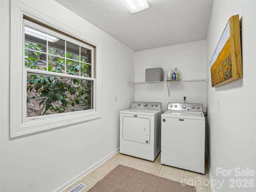 10 Chestnut Top Circle, Mills River, NC 28759.  MLS# CAR4392677, YatesRealty ID 35280. Main Level Laundry