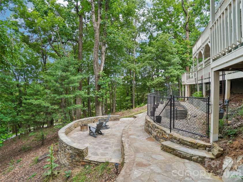 10 Chestnut Top Circle, Mills River, NC 28759.  MLS# CAR4392677, YatesRealty ID 35280. Stone Sitting area