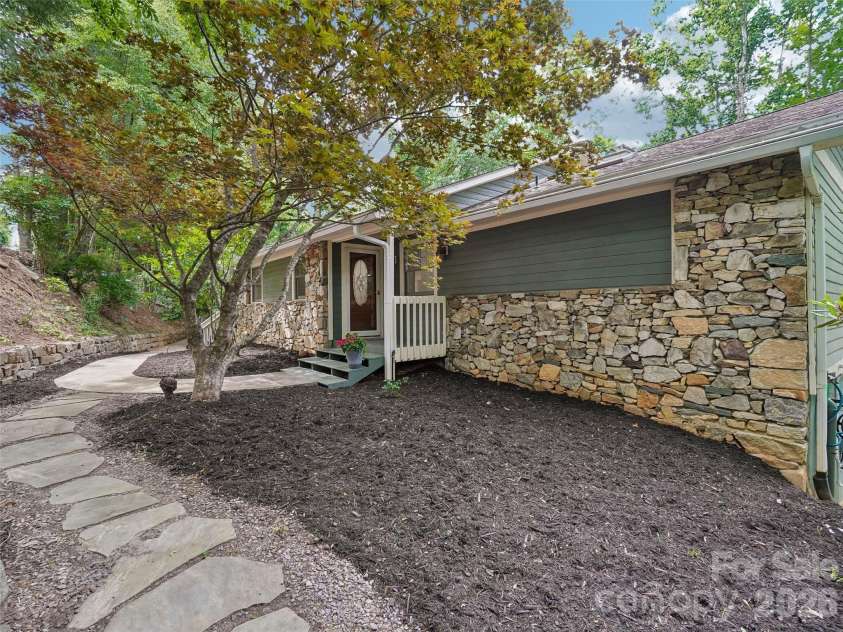 10 Chestnut Top Circle, Mills River, NC 28759.  MLS# CAR4392677, YatesRealty ID 35280. Stone walkway to front door.