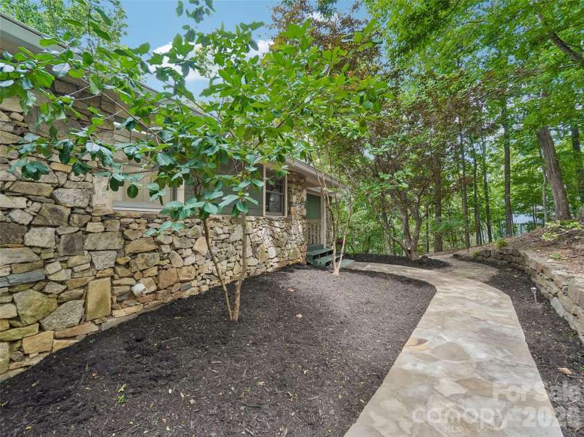10 Chestnut Top Circle, Mills River, NC 28759.  MLS# CAR4392677, YatesRealty ID 35280. Stone walkway to the front door.