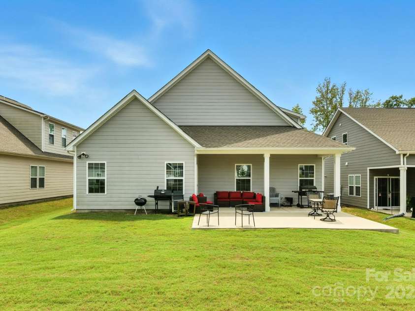 5112 Larewood Drive, Harrisburg, NC 28215.  MLS# CAR4297584, YatesRealty ID 35281. Level Backyard