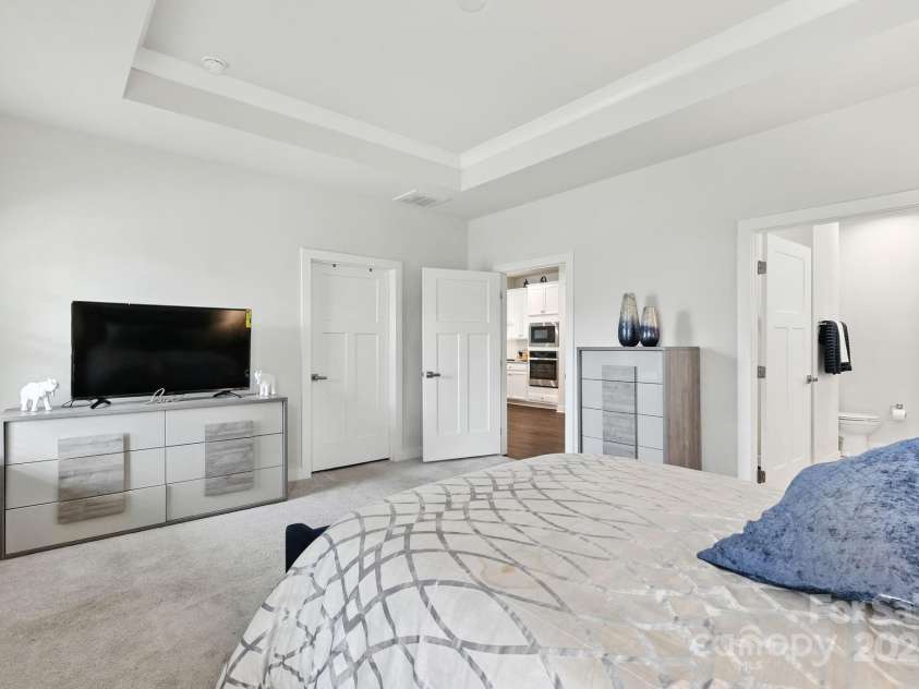 5112 Larewood Drive, Harrisburg, NC 28215.  MLS# CAR4297584, YatesRealty ID 35281. Main Level Primary Bedroom with Walk-In Closet and private Ensuite.