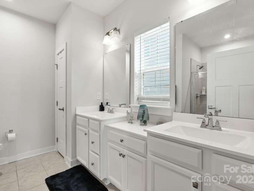 5112 Larewood Drive, Harrisburg, NC 28215.  MLS# CAR4297584, YatesRealty ID 35281. Primary Bathroom with Dual Vanities and plenty of Storage