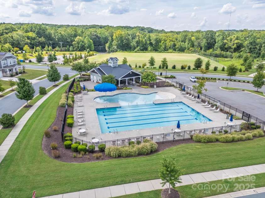5112 Larewood Drive, Harrisburg, NC 28215.  MLS# CAR4297584, YatesRealty ID 35281. The Community Amenities include Outdoor Pool, Cabana, Grilling Area, Playground, and access to the Harrisburg Holcomb Woods Soccer Fields.