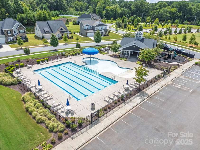 5112 Larewood Drive, Harrisburg, NC 28215.  MLS# CAR4297584, YatesRealty ID 35281. The Community Amenities include Outdoor Pool, Cabana, Grilling Area, Playground, and access to the Harrisburg Holcomb Woods Soccer Fields.