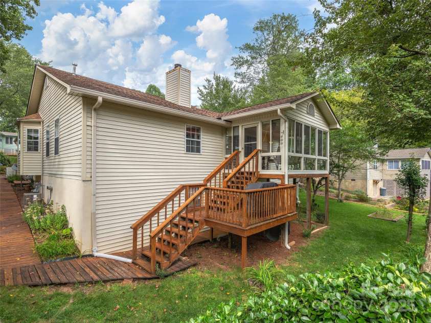 3 Wentworth Court, Etowah, NC 28729.  MLS# CAR4297402, YatesRealty ID 35283. Back exterior and grilling area