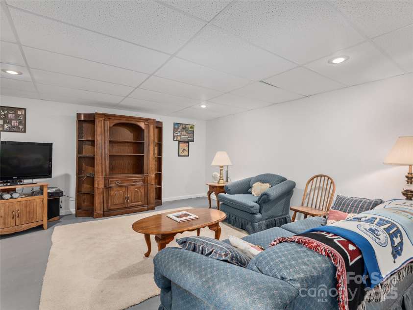 3 Wentworth Court, Etowah, NC 28729.  MLS# CAR4297402, YatesRealty ID 35283. Basement Recreation/Entertainment - Heated- Not included in square footage