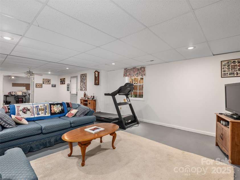 3 Wentworth Court, Etowah, NC 28729.  MLS# CAR4297402, YatesRealty ID 35283. Basement Recreation/Entertainment - Heated- Not included in square footage