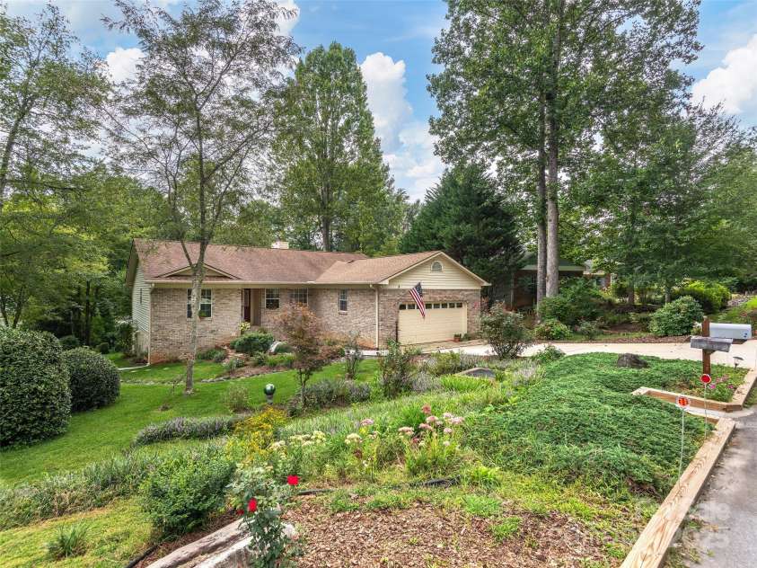 3 Wentworth Court, Etowah, NC 28729.  MLS# CAR4297402, YatesRealty ID 35283. Beautiful front yard