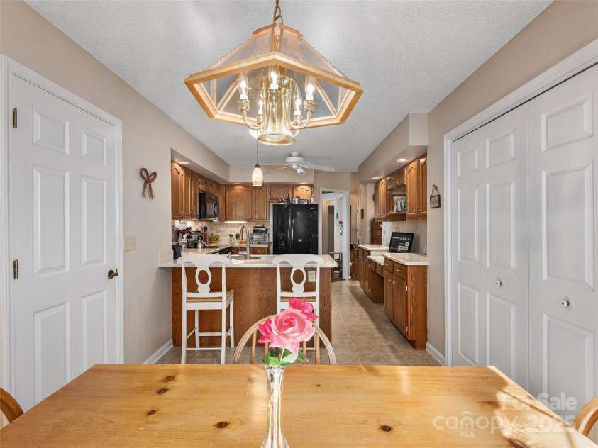 3 Wentworth Court, Etowah, NC 28729.  MLS# CAR4297402, YatesRealty ID 35283. Breakfast area and a Breakfast bar! 