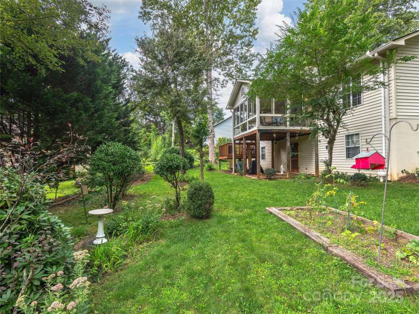 3 Wentworth Court, Etowah, NC 28729.  MLS# CAR4297402, YatesRealty ID 35283. Peaceful backyard to enjoy the outdoors