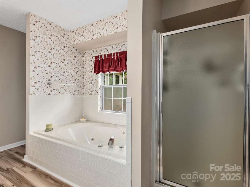 3 Wentworth Court, Etowah, NC 28729.  MLS# CAR4297402, YatesRealty ID 35283. Primary Bath with tub and separate shower