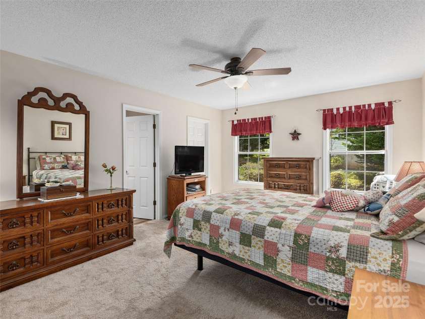 3 Wentworth Court, Etowah, NC 28729.  MLS# CAR4297402, YatesRealty ID 35283. Primary Bedroom 16'8 x 11'11 with walk in cloaet