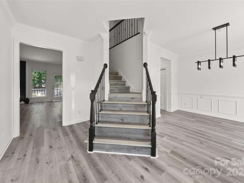 9418 Arborview Court, Charlotte, NC 28269.  MLS# CAR4285761, YatesRealty ID 35290. New LVP flooring and stairs