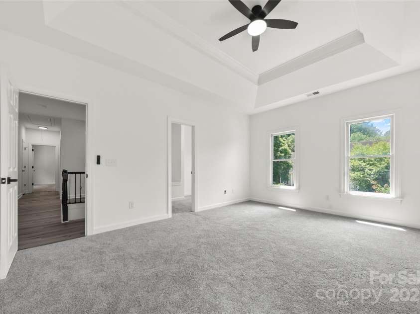 9418 Arborview Court, Charlotte, NC 28269.  MLS# CAR4285761, YatesRealty ID 35290. Primary Bedroom - new carpet and fan/light combo
