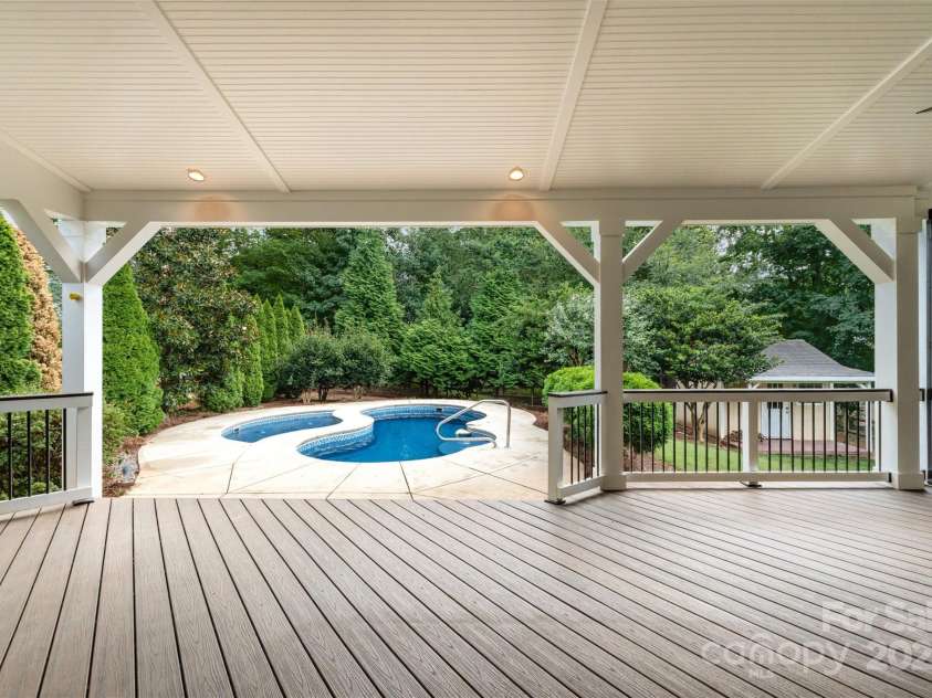 2746 Cameron Commons Way, Matthews, NC 28104.  MLS# CAR4242732, YatesRealty ID 35293. Deck to pool