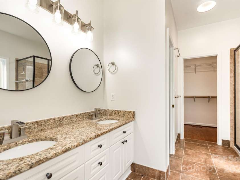 2746 Cameron Commons Way, Matthews, NC 28104.  MLS# CAR4242732, YatesRealty ID 35293. Primary bath and walk in