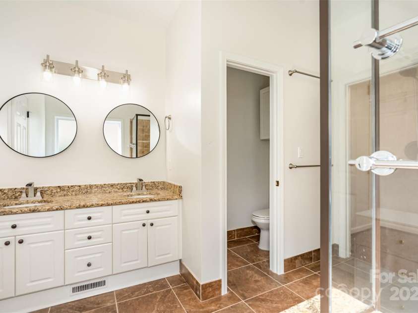 2746 Cameron Commons Way, Matthews, NC 28104.  MLS# CAR4242732, YatesRealty ID 35293. Primary bathroom