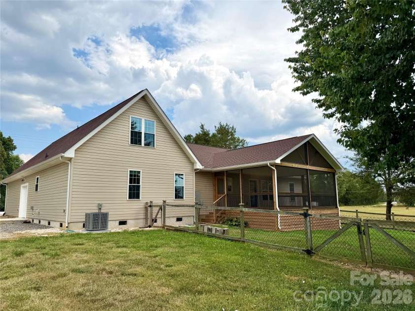 1027 Tabor Road, Olin, NC 28660.  MLS# CAR4399762, YatesRealty ID 35295. Backyard