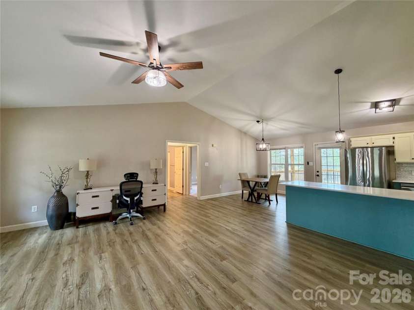 1027 Tabor Road, Olin, NC 28660.  MLS# CAR4399762, YatesRealty ID 35295. Bar and dining area